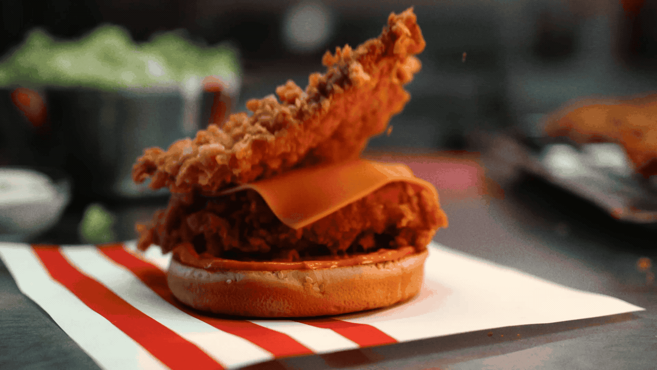 A KFC boneless chicken sandwich bouncing