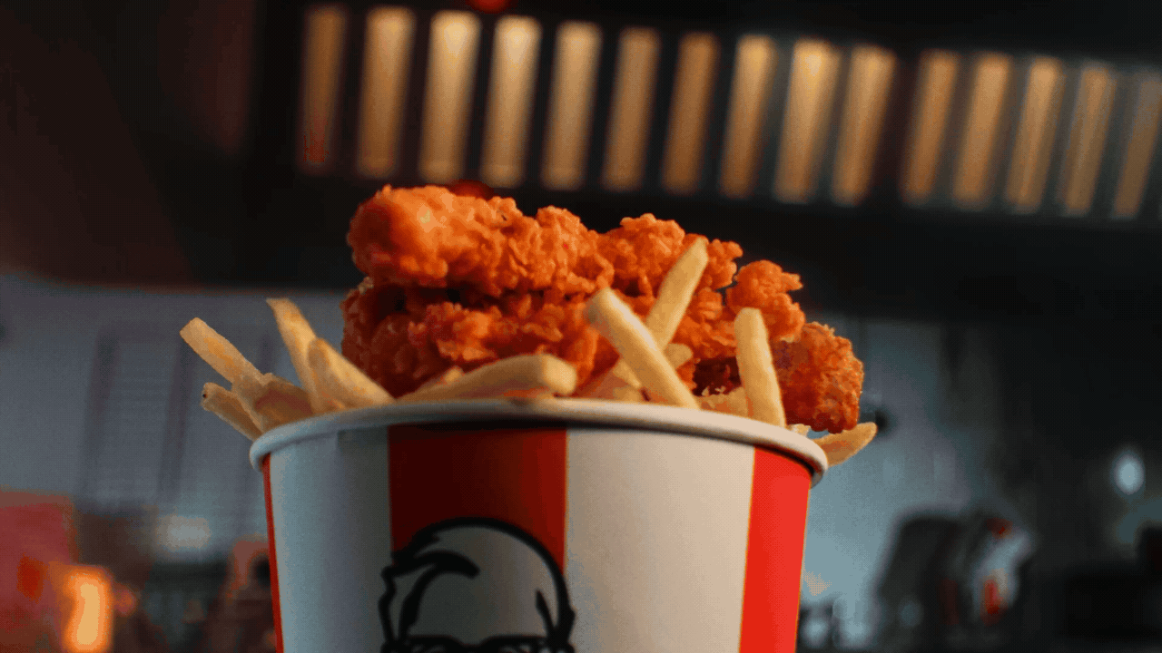 KFC boneless chicken bouncing above a bucket